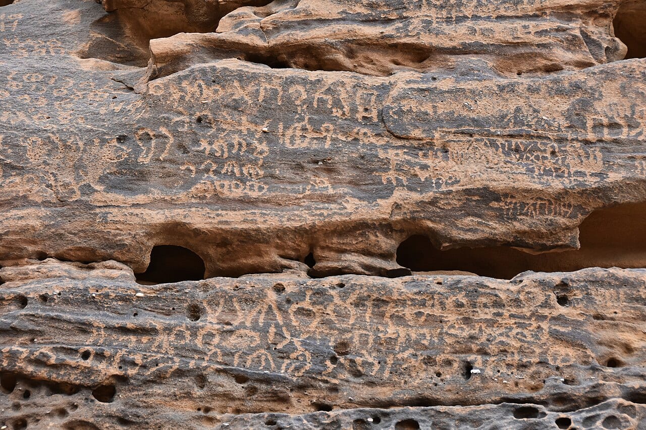 Ancient inscriptions carved on the rocks of Jabal Ikmah