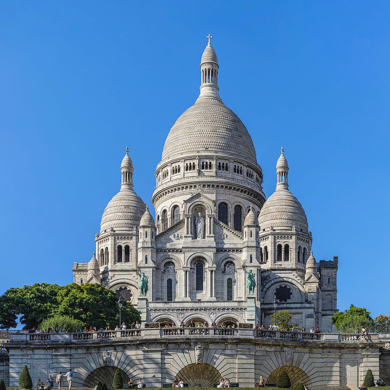 The Basilica of the Sacred Heart of Montmartre seen from Square Louise Michel in Paris
