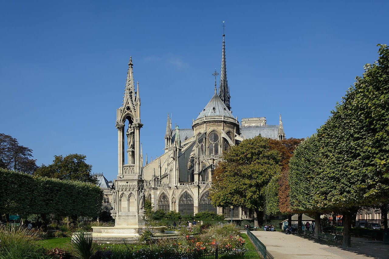 Notre-Dame Cathedral east view and the Fountain of the Virgin in Paris