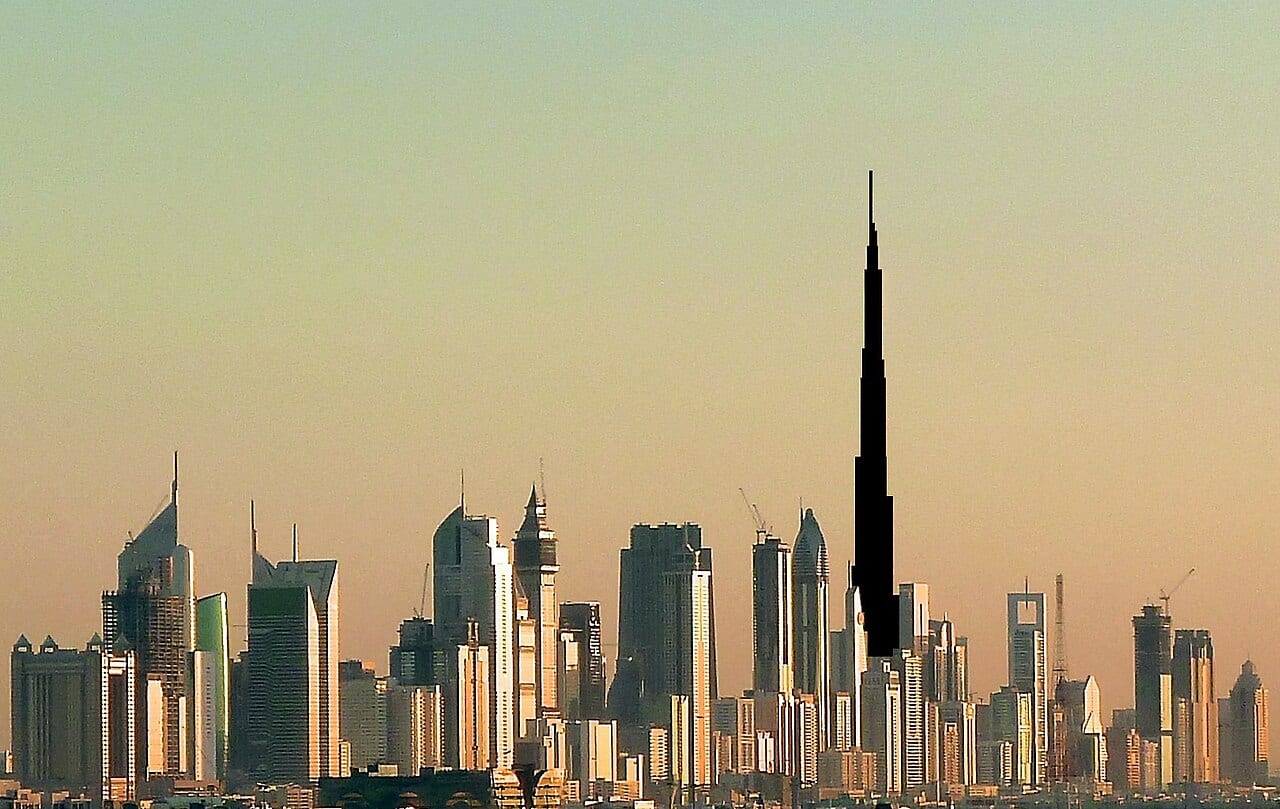 Burj Khalifa rising above Downtown Dubai at dusk