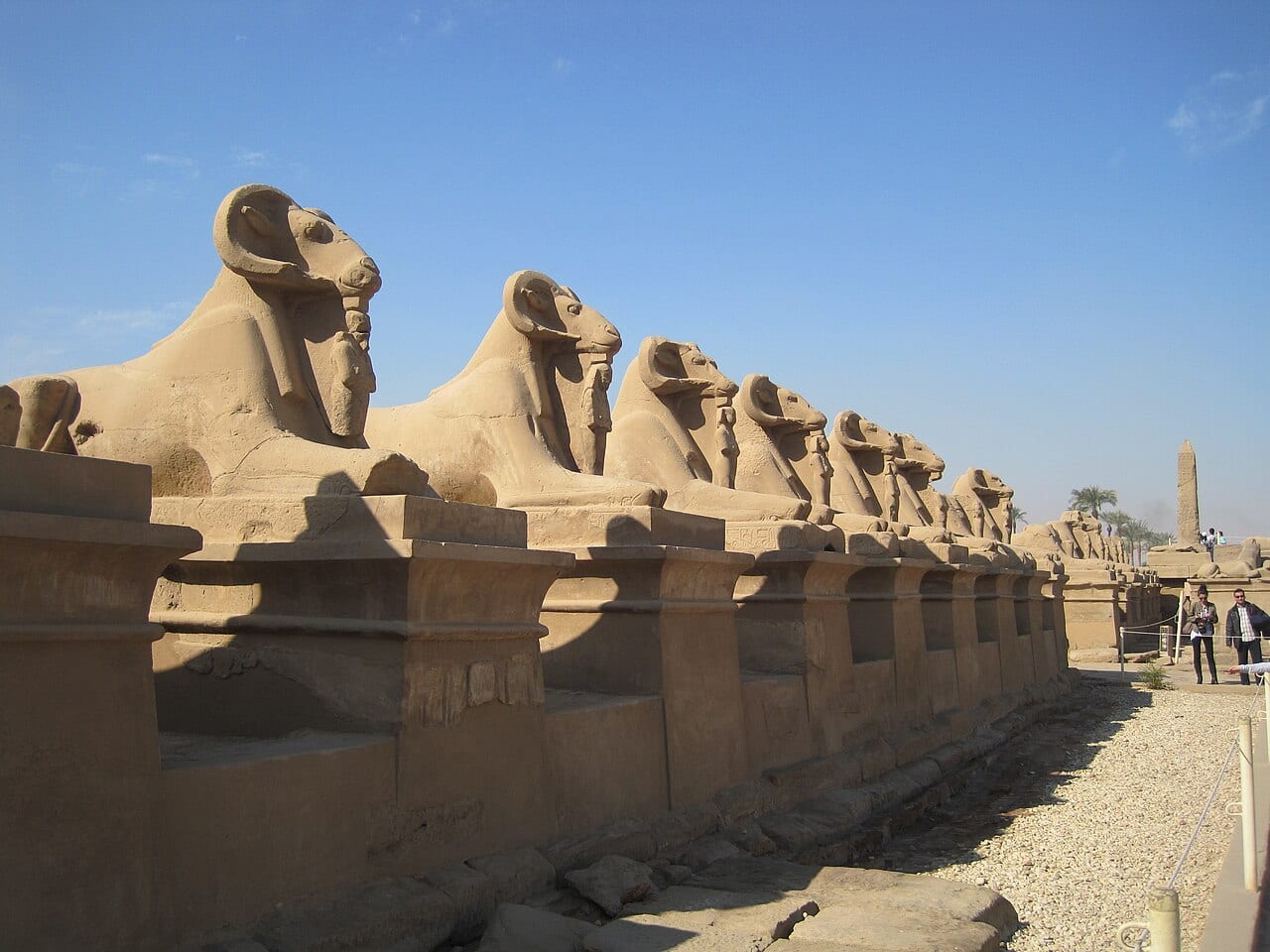 A row of ram-headed sphinxes along the Avenue of Sphinxes in Luxor